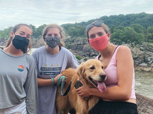 Isabel with friends and friends' dog.